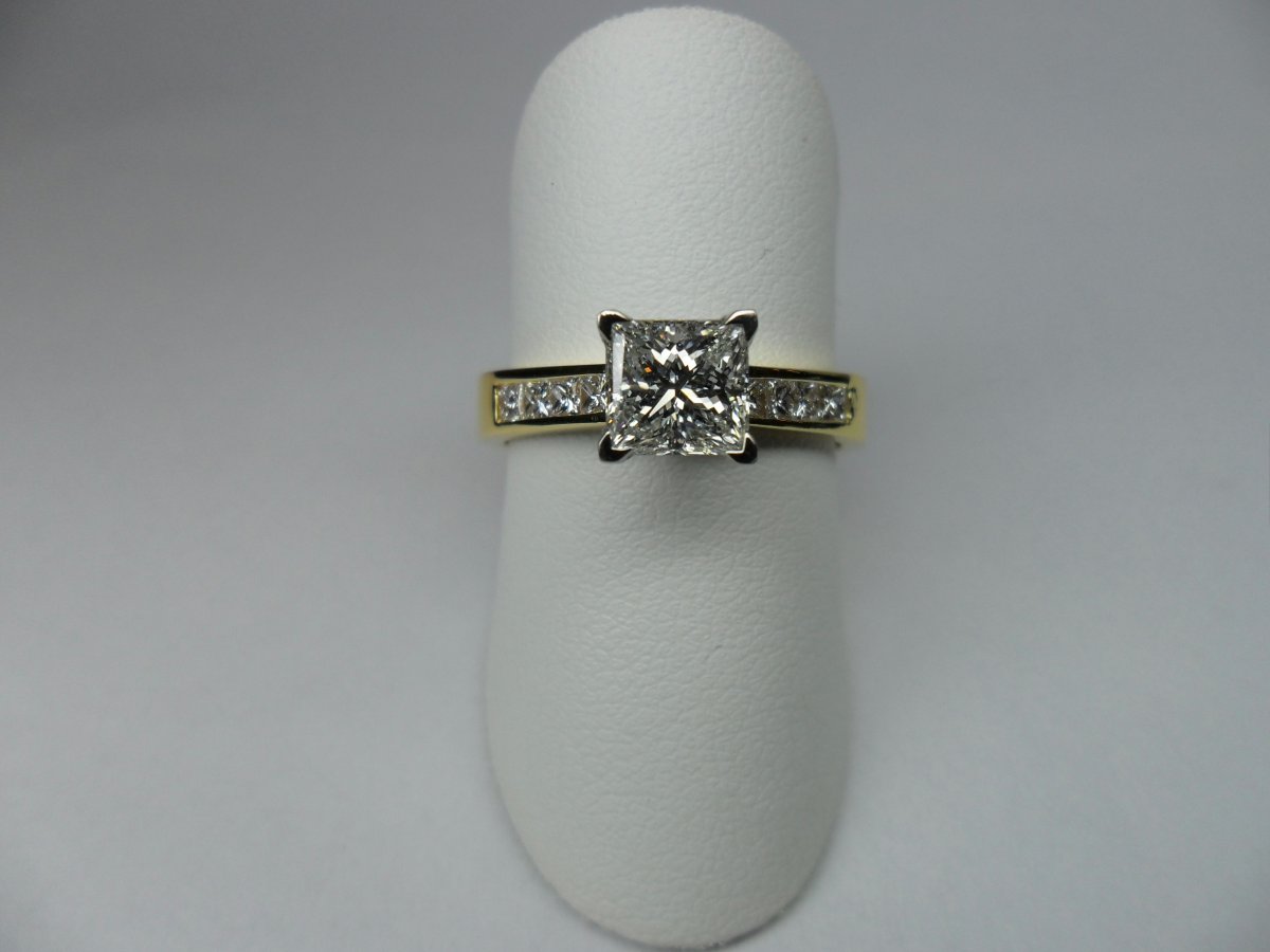 Princess Rail Solitaire Ring Yellow Gold